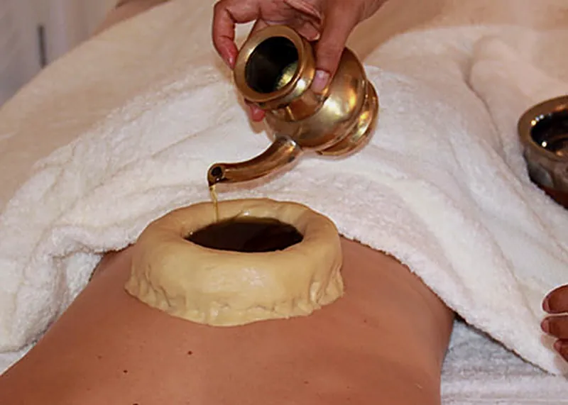Warm oil poured into a dough ring